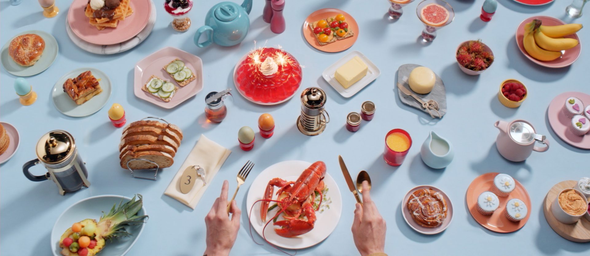 Table of food and drinks in a restaurant for Hotels.com and Klarna by CPB London